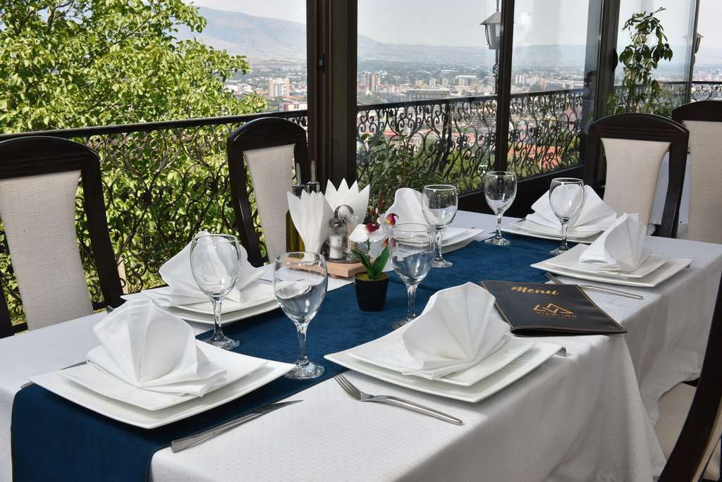View Inn Boutique Hotel سكوبجي المطعم الصورة